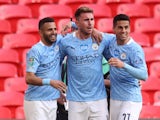 Manchester City's Aymeric Laporte celebrates scoring against Tottenham Hotspur in the EFL Cup final on April 25, 2021