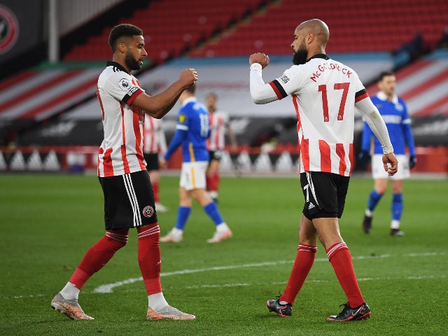 Sheffield United's David McGoldrick celebrates scoring their first goal against Brighton & Hove Albion in the Premier League on April 24, 2021