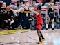 Denver Nuggets center Nikola Jokic controls the ball as Toronto Raptors forward OG Anunoby guards on April 30, 2021
