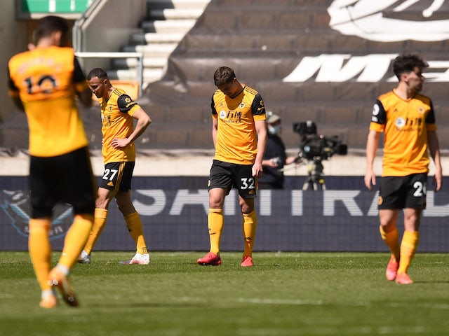 Wolverhampton Wanderers players looks dejected after the match on April 25, 2021
