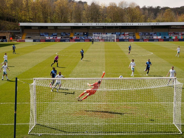 Wycombe Wanderers' Uche Ikpeazu scores their first goal against Bournemouth in the Championship on May 1, 2021