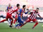 FC Barcelona's Lionel Messi in action with Atletico Madrid's Koke in La Liga on May 8, 2021