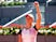 Elise Mertens celebrates beating Simona Halep at the Madrid Open on May 4, 2021