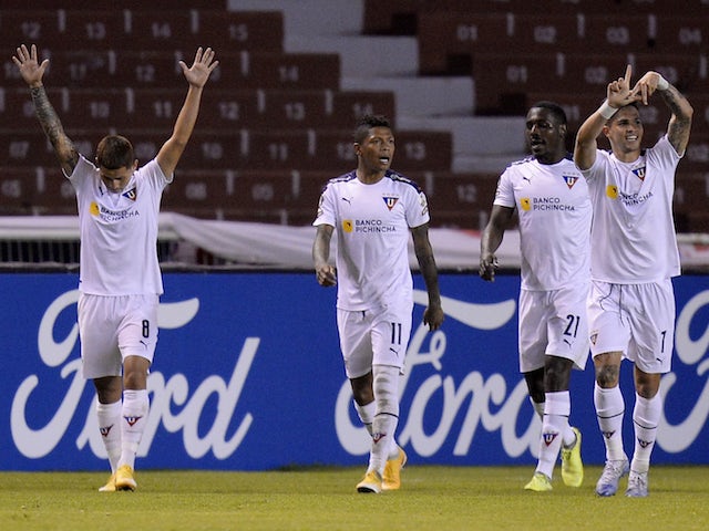 LDU Quito's Luis Amarilla celebrates scoring their second goal on May 4, 2021