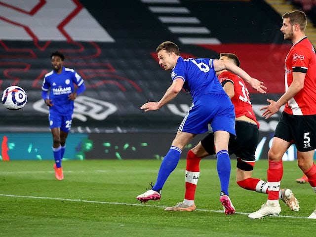 Leicester City's Jonny Evans scores their first goal on April 30, 2021