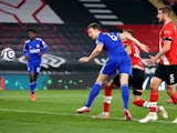 Leicester City's Jonny Evans scores their first goal on April 30, 2021