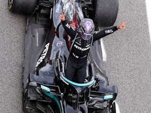 Vettel, Wolff back Hamilton over racing costs