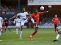 Luton Town's Elijah Adebayo in action with Rotherham United's Michael Ihiekwe in the Championship on May 4, 2021