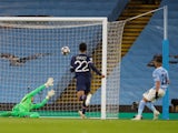 Manchester City's Riyad Mahrez scores their second goal against Paris Saint-Germain in the Champions League on May 4, 2021