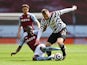 Manchester United's Luke Shaw in action with Aston Villa's Bertrand Traore in the Premier League on May 9, 2021