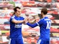 Leicester City's Caglar Soyuncu celebrates scoring their second goal with James Maddison against Manchester United in the Premier League on May 11, 2021