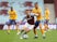 Aston Villa's John McGinn in action with Everton's Dominic Calvert-Lewin in the Premier League on May 13, 2021