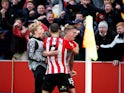 Brentford's Marcus Forss celebrates scoring their third goal against Bournemouth in the Championship playoffs on May 22, 2021
