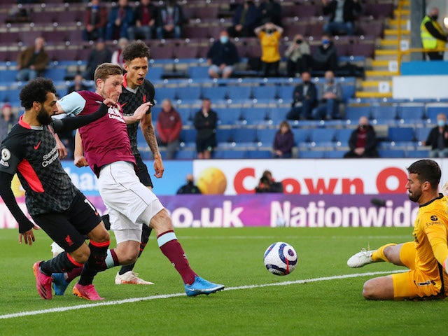 Burnley's Chris Wood shoots at goal against Liverpool in the Premier League on May 19, 2021
