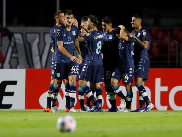 Racing Club's Imanol Segovia celebrates scoring their first goal with teammates on 18 May, 2021