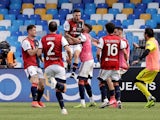 Cagliari's Nahitan Nandez celebrates scoring their first goal with teammates on May 2, 2021