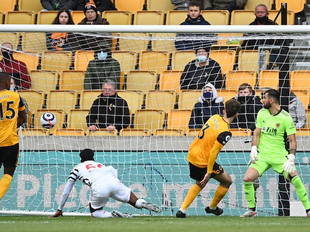Manchester United's Anthony Elanga scores against Wolverhampton Wanderers in the Premier League on May 23, 2021