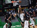 Boston Celtics forward Jayson Tatum shoots the ball over Brooklyn Nets forward Bruce Brown on May 29, 2021