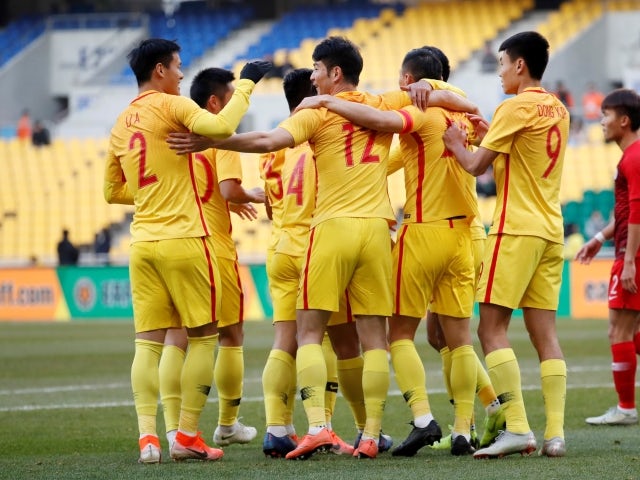 China's Xiang Ji celebrates with teammates pictured in December 2019