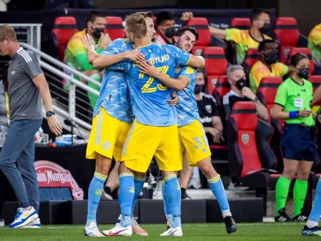Philadelphia Union forward Kacper Przybylko celebrates with teammates after a replay review credits him with a goal on May 23, 2021