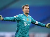 Bayern Munich's Manuel Neuer celebrates after Leon Goretzka scored their first goal in April 2021