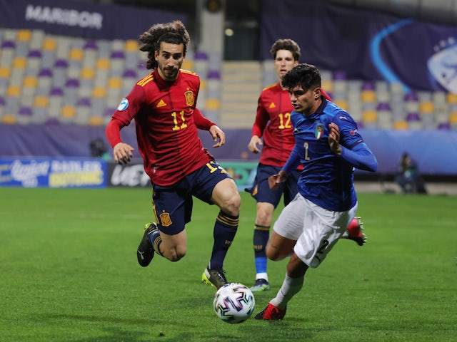 Spain U21 player Marc Cucurella in action with Italy U21 player Raoul Bellanova on March 27, 2021