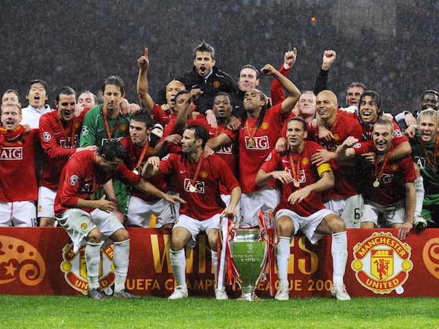 Manchester United players celebrate winning the 2008 Champions League final