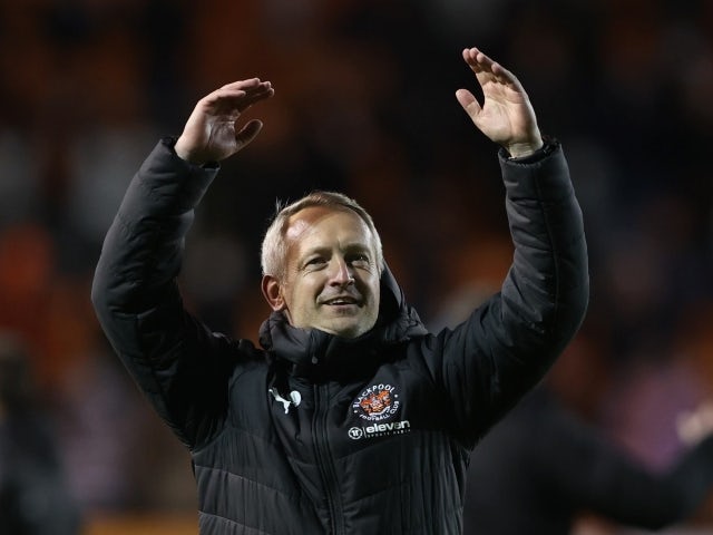 Blackpool's manager Neil Critchley celebrates after the match against Oxford on May 21, 2021