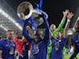 Chelsea midfielder N'Golo Kante lifts the Champions League trophy on May 29, 2021