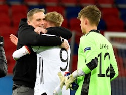 Germany under-21s manager Stefan Kuntz with Jonathan Burkhardt on March 27, 2021