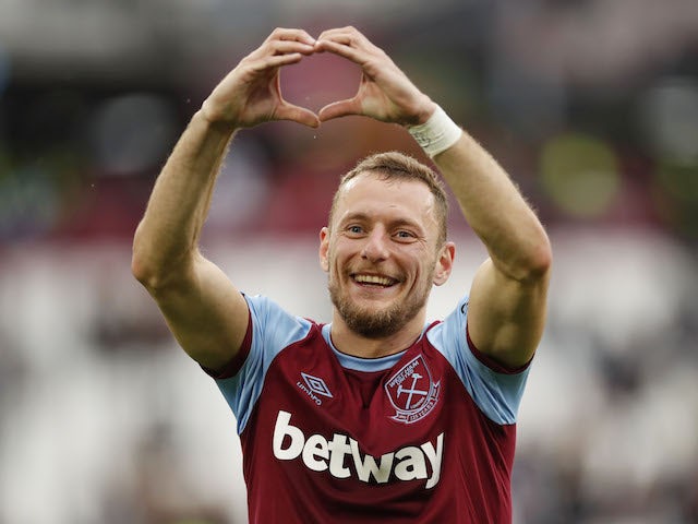 West Ham United's Vladimir Coufal celebrates qualifying for the Europa League after the match on May 23, 2021
