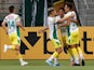 Defensa y Justicia's Walter Bou celebrates scoring their first goal with teammates on May 18, 2021