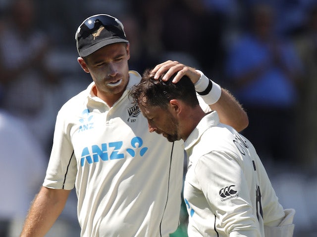 New Zealand's Tim Southee congratulates Devon Conway during the clash with England on June 3, 2021