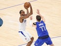 LA Clippers forward Kawhi Leonard shoots over Dallas Mavericks guard Luka Doncic on June 5, 2021