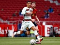 Spain's Aymeric Laporte in action with Portugal's Cristiano Ronaldo on June 4, 2021