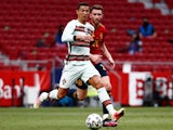 Spain's Aymeric Laporte in action with Portugal's Cristiano Ronaldo on June 4, 2021