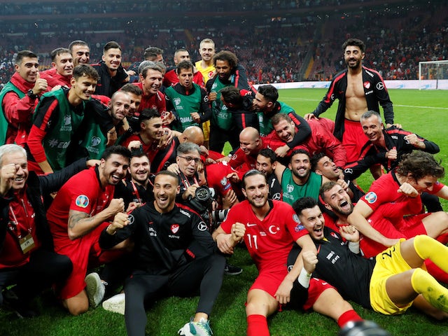 Turkey players celebrate qualifying for Euro 2020 in November 2019