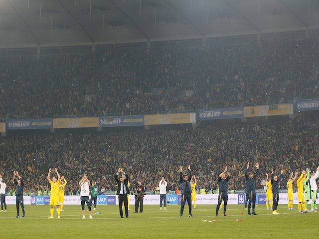 Ukraine players and staff celebrate qualifying for Euro 2020 in October 2019