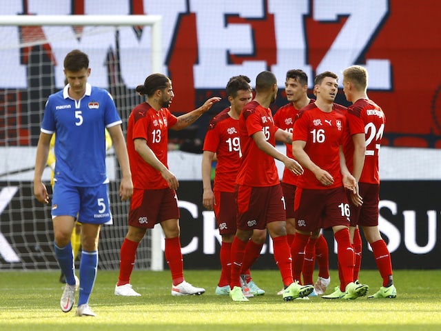 Switzerland's team celebrates scoring their third goal on June 3, 2021
