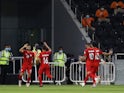 Afghanistan's Omid Popalzay celebrates scoring their first goal with teammates on June 11, 2021