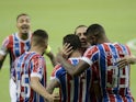 Bahia's Rossi celebrates scoring their first goal with teammates on February 13, 2021