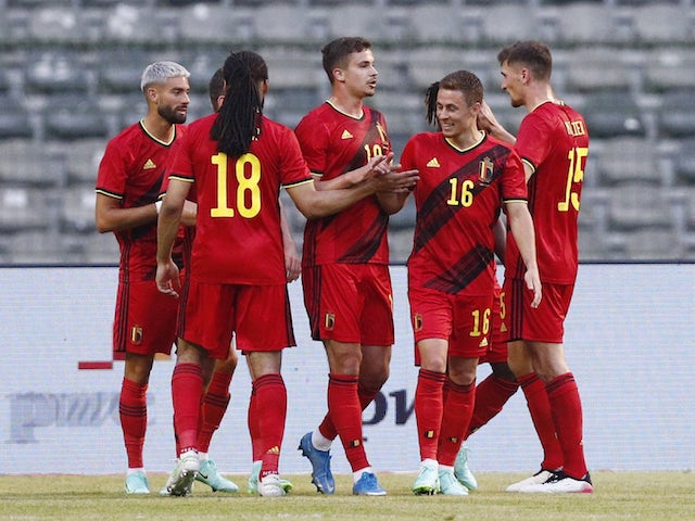 Belgium players celebrate scoring against Greece on June 3, 2021