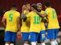 Brazil players celebrate scoring on June 5, 2021