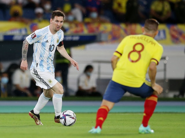 Argentina's Lionel Messi in action with Colombia's Gustavo Cuellar on June 8, 2021