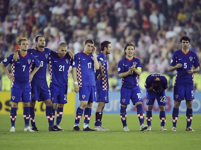 Croatia players look dejected after being knocked out of Euro 2008
