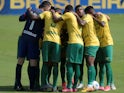 Cuiaba players huddle before the match on June 6, 2021