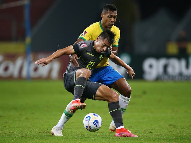 Ecuador's Alan Franco in action with Brazil's Alex Sandro on June 5, 2021