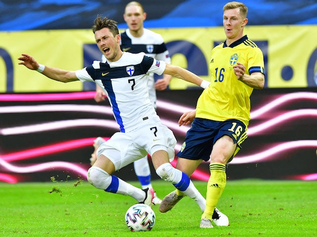 Finland's Thomas Lam in action with Sweden's Emil Krafth on May 29, 2021