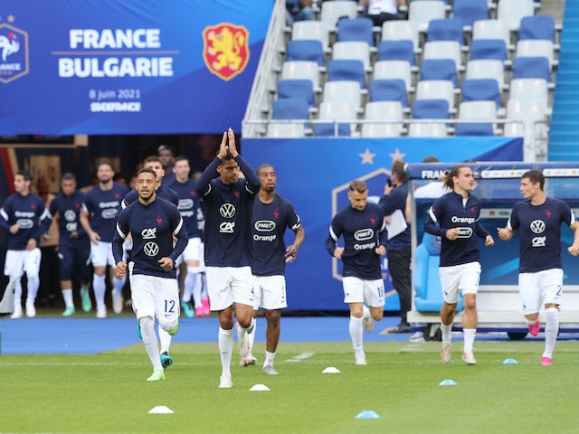 France players warm up ahead of their game against Bulgaria on June 8, 2021