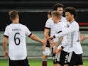 Germany players celebrate scoring against Latvia on June 7, 2021